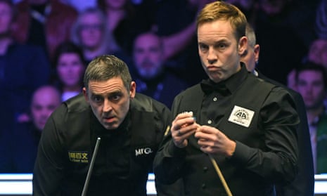 Ronnie O'Sullivan and Ali Carter during last year’s Masters final at Alexandra Palace
