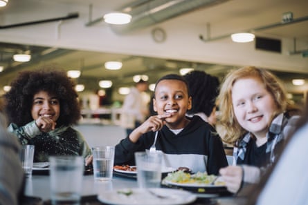 Children eating in a school canteen