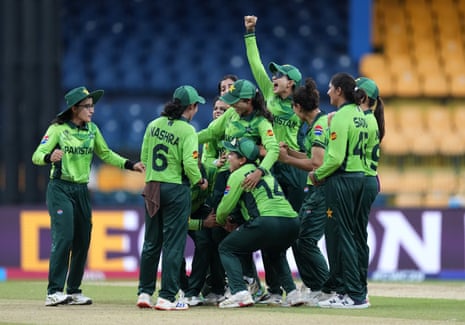 Rameem Shamim of Pakistan is hoisted aloft by her teammates aftertaking the wicket of Alice Capsey.