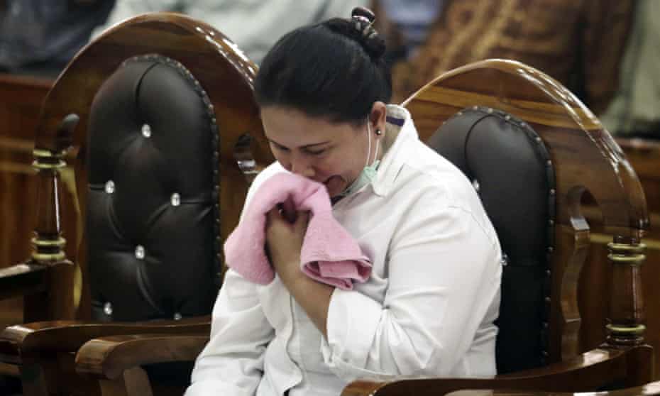Ethnic Chinese woman Meiliana weeps during her sentencing hearing at a district court in Medan, North Sumatra, Indonesia.