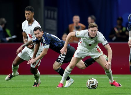 Lionel Messi of Argentina and England’s Elliot Anderson battle for the ball