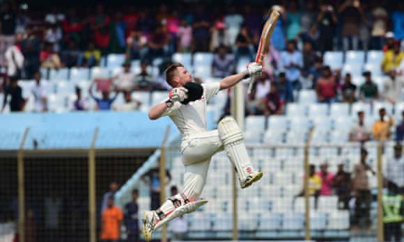 Australian cricketer David Warner reacts after scoring a century during the third day of the second cricket Test between Bangladesh and Australia