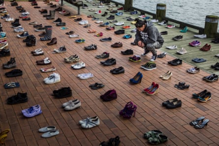 The 606 pairs of shoes represent each person lost in the last year to suicide in New Zealand.