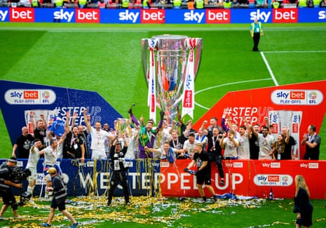 Port Vale celebrate winning the Sky Bet League Two Playoff final with the Playoff Trophy.