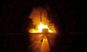 A picture released by the French Defence audiovisual communication and production unit (ECPAD) shows the launching of a cruise missile from a French military vessel in the Mediterranean sea towards targets in Syria