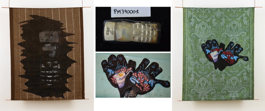 Textile paintings Mobile Phone, 2017, left, and Dark woollen gloves with red and blue Spiderman print, 2017, with the lost belongings that inspired them