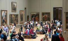 People viewing art in the Louvre, Paris