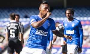 Alfredo Morelos sucks his thumb after scoring.