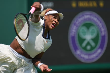 Serena Williams serves during a believe convention up of nan Wimbledon Tennis Championships