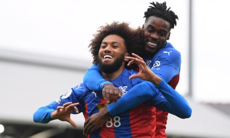 CJairo Riedewald of Crystal Palace is congratulated by teammate Jeffrey Schlupp after opening the scoring.