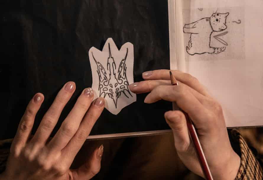 A stylized coat of arms of Ukraine drawn during a tattoo marathon