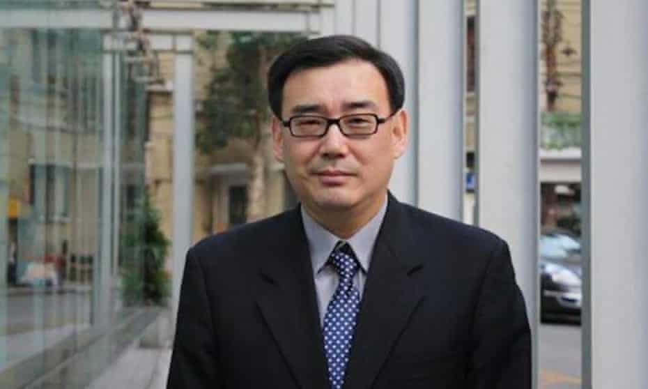 Image of Yang Hengjun in a suit