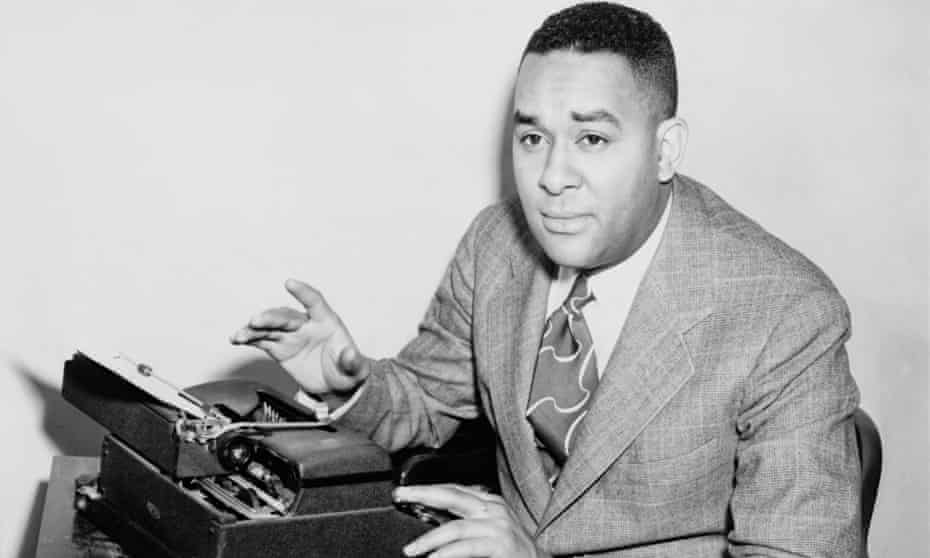 Richard Wright, seated at typewriter in 1945, the year he published his autobiography, Black Boy.