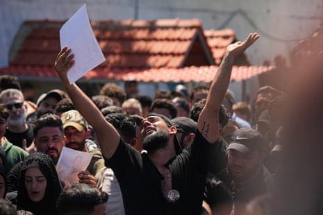 Mourners gather at the funeral of four people killed in an Israeli strike, in Ansariyeh, Lebanon.