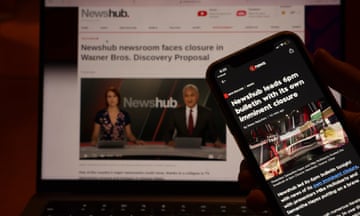 Warner Bros Discovery Announces Plans To Close Newshub In New Zealand<br>AUCKLAND, NEW ZEALAND - FEBRUARY 28: In this photo illustration the Newshub homepage is displayed on a laptop, alongside a news article on the networks pending closure on an iPhone on February 28, 2024 in Auckland, New Zealand. Warner Bros Discovery announced plans to close Newshub in June with consultations to take place until a final decision is made in April. (Photo illustration by Phil Walter/Getty Images)