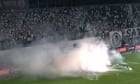 Santos game abandoned after fans throw rockets onto pitch - video
