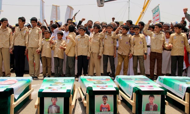 Yemeni children vent anger against Riyadh and Washington as they take part in a mass funeral for the 40 children killed in an air strike by the Saudi-led coalition last week.