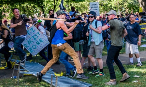 White supremacist groups clash with counter-protesters on 12 August 2017 in Charlottesville, Virginia.