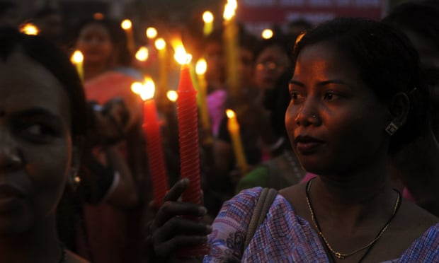 Indian sex workers and supporters march in a candle-lit procession in Kolkata