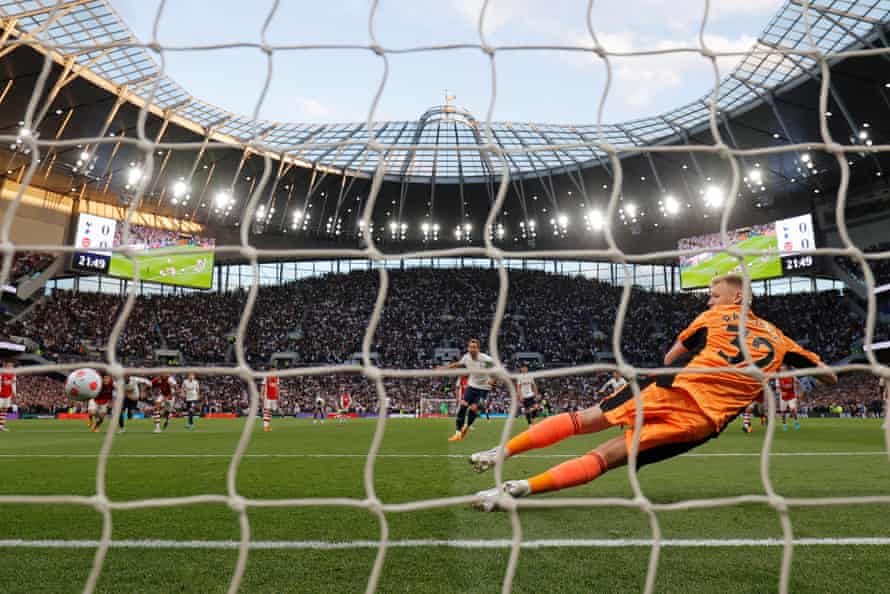 Tottenham’s Harry Kane sends Arsenal keeper Aaron Ramsdale the wrong way to open the scoring from the penalty spot during a 3-0 win.