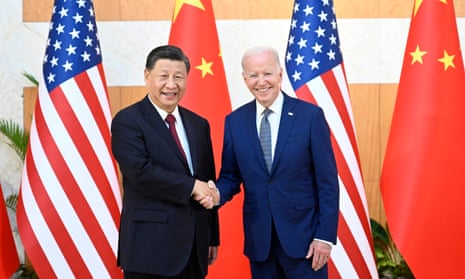 Xi Jinping and Joe Biden smile for the camera. 