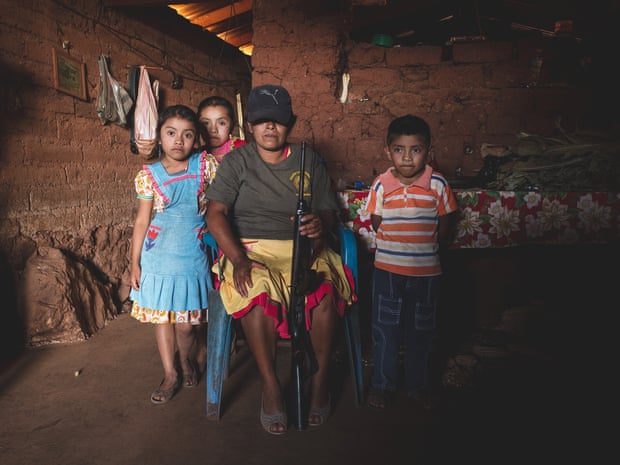 Forgotten GuerreroMexico; Guerrero; Rincon De Chautla; 12/01/20 Portrait of a mother from Rincon De Chautla with her children. Like other women she decided to became part the police community to protect her family.