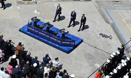 The three leaders approach the podium for their press conference