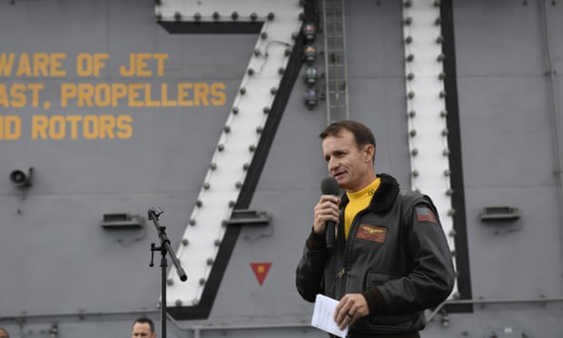Capt Brett Crozier addresses the crew of the USS Theodore Roosevelt.