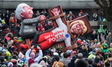 A float featuring an effigy of Jarosław Kaczyński, leader of Poland’s ruling Law and Justice party, overpowering ‘the liberal Poland’, at a parade in Düsseldorf, Germany in March this year.