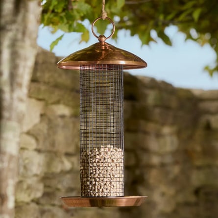 Copper feeder by Cox & Cox