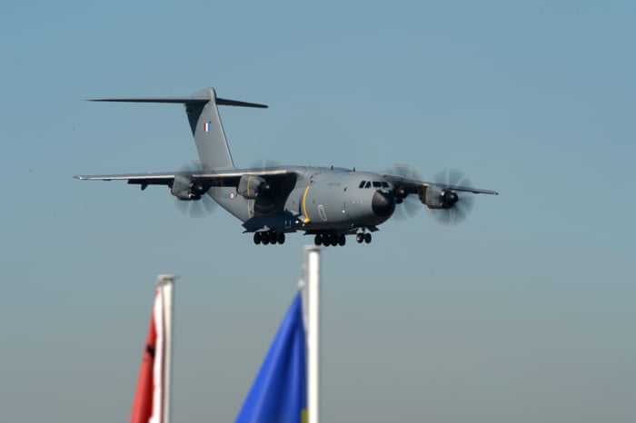 A Airbus A400M carrying French President Emmanuel Macron lands at Le Bourget airport for the opening of the International Paris Air Show.