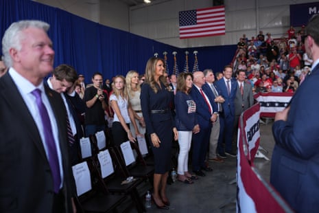 Congressman Mike Collins, a Georgia Republican, left, and Kelly Loeffler, the head of the Small Business Administration, center, at a campaign rally at Dalton Municipal Airport on Friday.