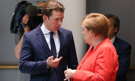 The German chancellor, Angela Merkel, talks to the Austrian prime minister, Sebastian Kurz, during the summit in Brussels.