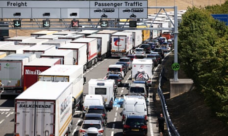 Vehicles queue to enter the Eurotunnel terminal in Folkestone on Sunday.