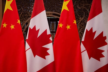 The Chinese and Canadian national flags next to each other
