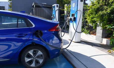 Electric cars and charging stations are seen at Tritium, Brisbane, Friday, March 31, 2023. (AAP Image/Jono Searle) NO ARCHIVING