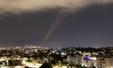 Israel’s anti-missile system in operation after Iran launched drones and missiles, as seen from Ashkelon, Israel, on Sunday.