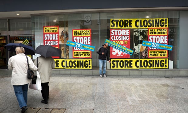 Shoppers outside British Home Stores (BHS) in 2016
