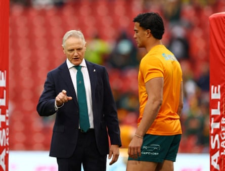 Australia head coach Joe Schmidt speaks to Joseph-Aukuso Suaalii.
