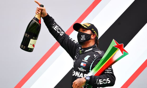 Lewis Hamilton celebrates his record-breaking 92nd race win in the Portuguese Grand Prix