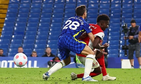 Chelsea’s Cesar Azpilicueta fouls Arsenal’s Bukayo Saka leading to a penalty.