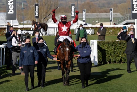 Tiger Roll and Keith Donoghue celebrate after they win the Glenfarclas Cross Country Chase.