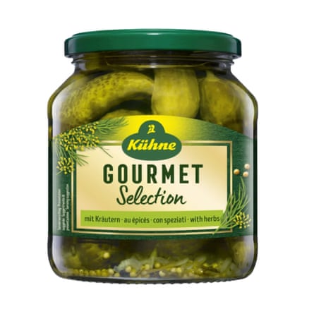 A jar of Kuhne Gourmet Gherkins with Herbs