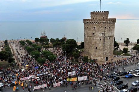 Supporters of the NO vote in the upcoming referendum gather near the White Tower, the city’s landmark, in Thessaloniki on June 29, 2015. The ballot has been drawn up and a ‘Vote No’ poster designed: Greek Prime Minister Alexis Tsipras’s government has lost no time in preparing for the country’s hotly-anticipated bailout referendum. AFP PHOTO / SAKIS MITROLIDISSAKIS MITROLIDIS/AFP/Getty Images