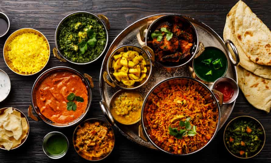 plates of curry and Indian food