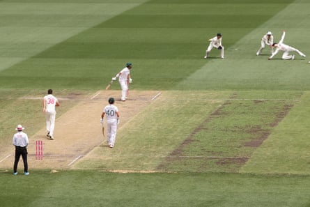 Steve Smith goes down in an attempt to catch Dean Elgar off the bowling of Josh Hazlewood.