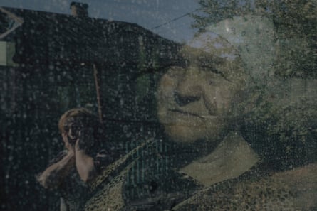 Liudmyla Petrovna, 86, leaves her home in Pokrovsk.