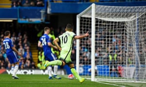 Manchester City's Sergio Agüero scores against Chelsea