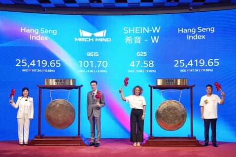 Representatives of Shein International Holdings Ltd and Mech-Mind (Xiong'an) Robotics Technology Co Ltd attend the listing ceremony at the Hong Kong Stock Exchange on 1 September.