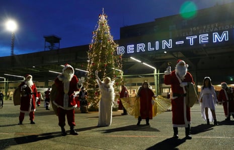 A group of Germans dressed as Santa and angels who rent themselves out over the Christmas period gathered in Berlin on 5 December, 2020, keen to spread joy and practice their “Ho-ho-hos” even though they have to wear masks. Most years, several hundred “Rent-a-Santa” meet at the beginning of the Christmas season in Germany, but this year just a few dozen got together, keeping their distance outside at the disused Tempelhof airfield in Berlin.